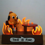 This is fine. Figurita de escritorio parlante con fuego luminoso