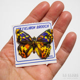 Broche de mariposa