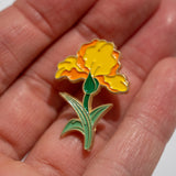 Pin clavel amarillo