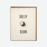 Postal "Turn it up to eleven"