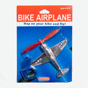 Avión de juguete para poner en el manillar de la bici