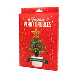 Adornos navideños alegres para plantas tristes de oficina