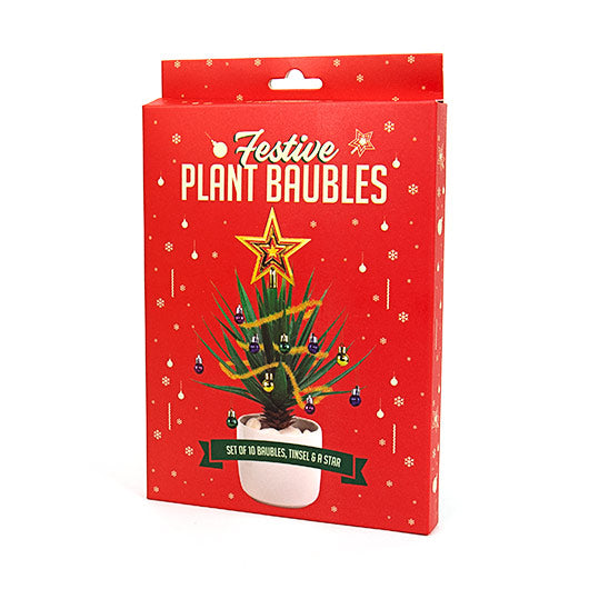 Adornos navideños alegres para plantas tristes de oficina